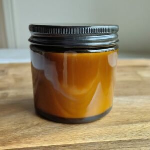 glass jar of bee propolis lotion